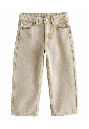 Beige vidbenede cowboybukser med bæltestropper, frontknap, lynlås og fem-lomme-design, lagt fladt på en hvid baggrund.