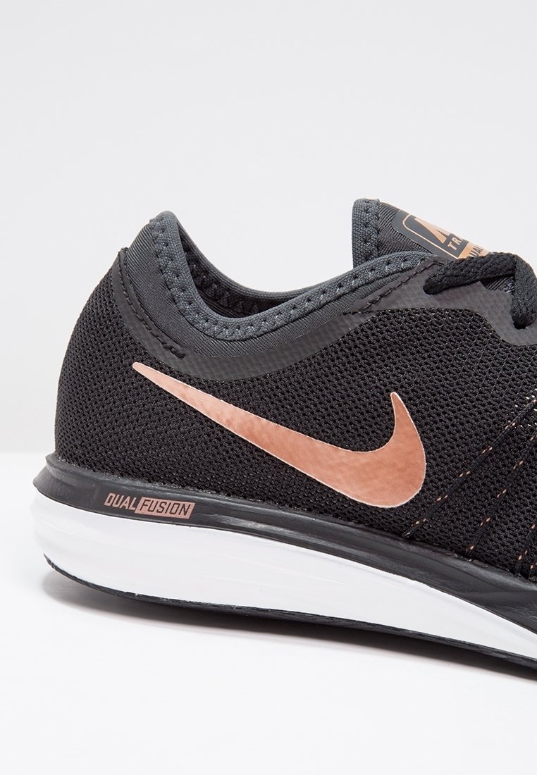 black nikes rose gold swoosh