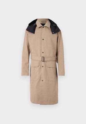 Beige trench coat with a black hood. Features a belt, button closures, and two front pockets. Smooth texture, knee-length design.