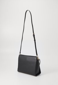Tommy Hilfiger LEGACY SATCHEL - Sac à main - black