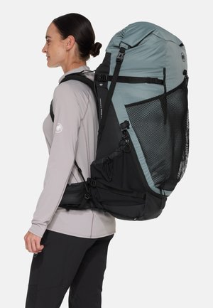 DUCAN SPINE 70-80 WOMEN - Hiking rucksack - strata/black