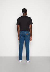 Wrangler SBORO - Calças de ganga de perna direita - blue