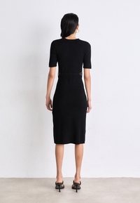 DKNY Neulemekko - black