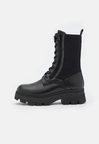 Calvin Klein Jeans CHUNKY COMBAT LACEUP ZIP - Botines con plataforma - black