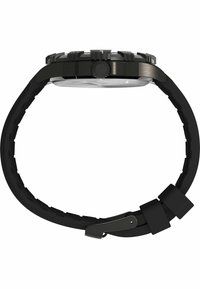 Orologio da polso nero con cassa rotonda e robusta, lunetta testurizzata, vetro chiaro e cinturino in gomma flessibile con chiusura a fibbia.