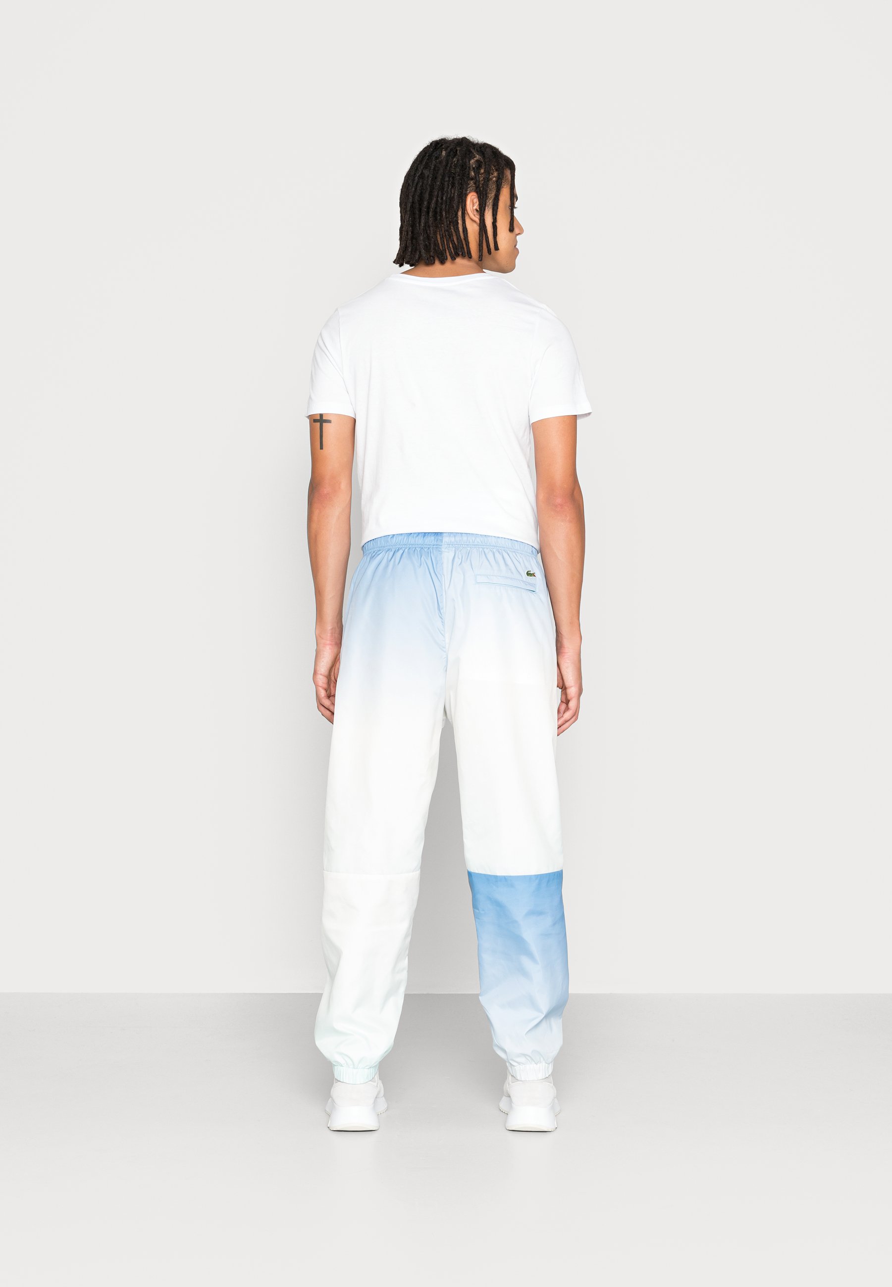Lacoste LIVE UNISEX - Tracksuit bottoms 