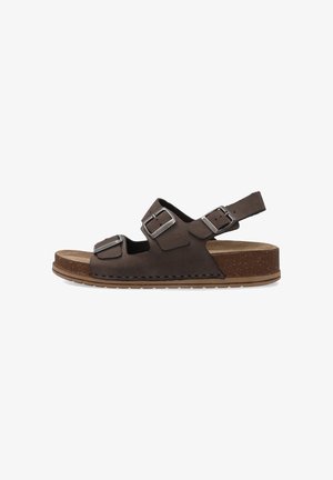 Brun open-toe sandal med to justerbare metalspænder over foden og én rundt om hælen, korkinspireret sål og flad gummi ydersål.