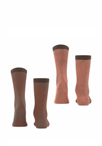 Gestreifte Socken mit einem braunen Oberschenkelbund und orange-braunen Streifen, aus einem glatten, dehnbaren Stoff gefertigt, der für Komfort und Passform sorgt.
