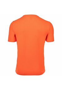 Koszulka z krótkim rękawem w jaskrawym pomarańczowym kolorze, wykonana z gładkiego, elastycznego materiału. Posiada okrągły dekolt i dopasowany krój.