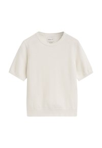 Vit kortärmad tröja i mjukt stickat material. Har rund halsringning och ribbad mudd och nederkant. Enkel, minimalistisk design.