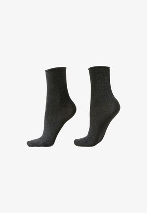 Sorte ankelstrømper med en blød tekstur og et diskret skær. Midt på læggen med en ribbet kant, velegnet til daglig brug.