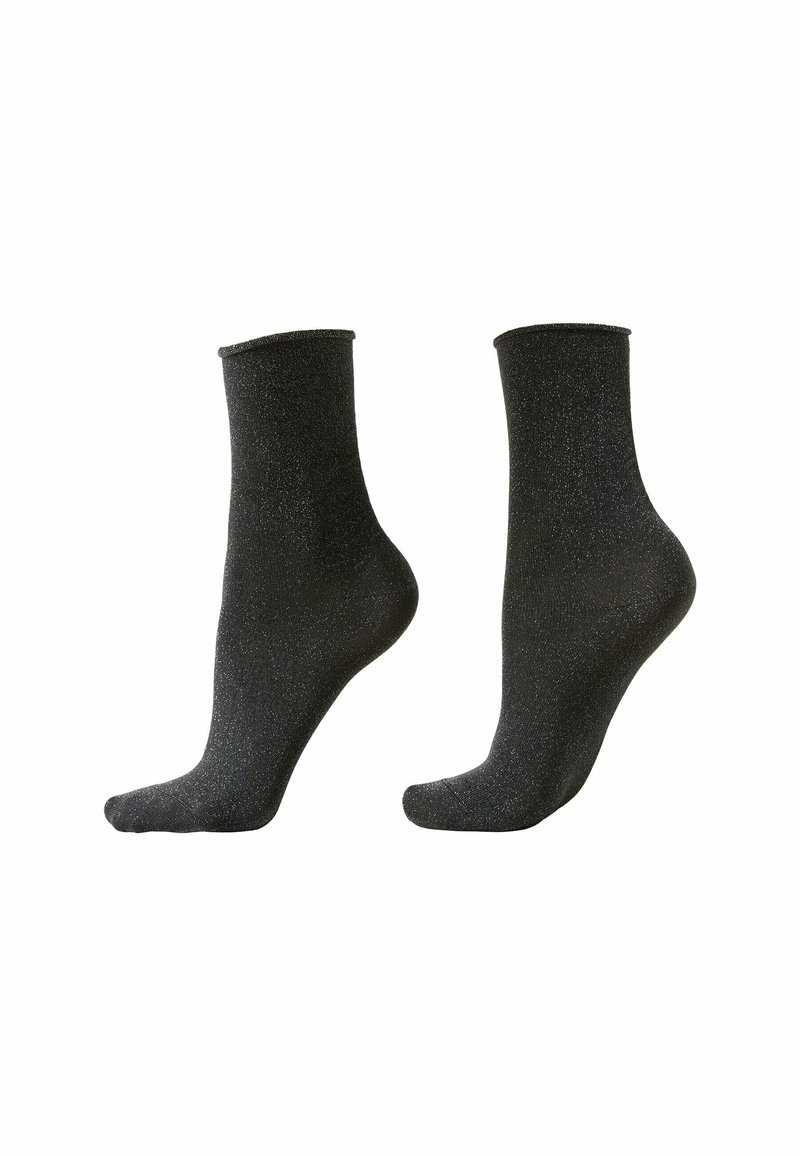 Schwarze Knöchelsocken mit weicher Textur und dezentem Schimmer. Mittlere Höhe bis zur Wade mit geripptem Bündchen, geeignet für den täglichen Gebrauch.