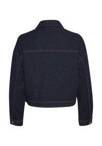 Tumman sininen farkkutakki takaa nähtynä, jossa on pitkät hihat, ruskeat ompeleet, napitetut hihansuut ja suora helma.