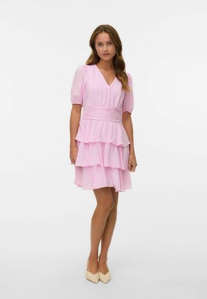 Pink tiered dress with short puff sleeves, V-neckline, and gathered waist. Made of textured fabric with a flowing silhouette.