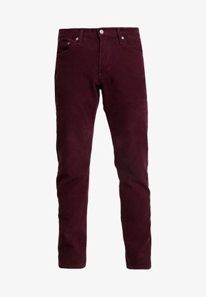 Pantalones de pana ajustados para hombre en burdeos oscuro con cierre de botón y cremallera, bolsillos delanteros y traseros.