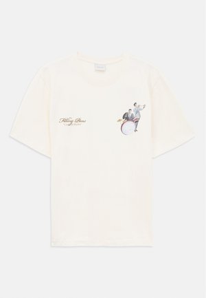 Off-white T-shirt with small print of two musicians, one playing trumpet and one on drums, and text "Filling Pieces 'United By Rhythm'".