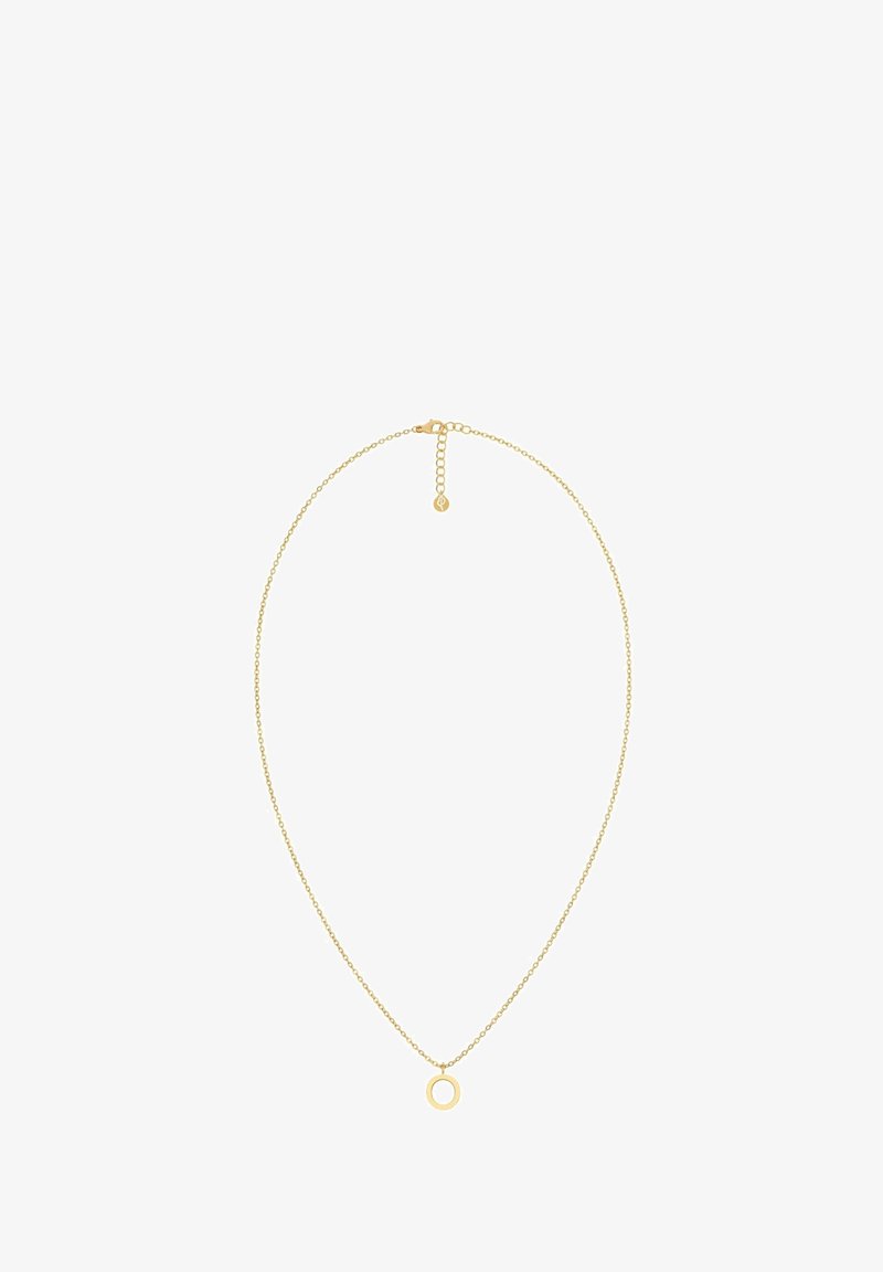 Kuldne kaelakee, millel on õhuke kett ja ümmargune ripats. Kinnitusel on reguleeritav ketise pikendus ja väike silt.