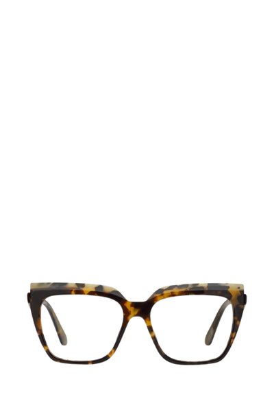 Occhiali a occhio di gatto con motivo tartarugato, in una miscela trasparente di marrone e crema, caratterizzati da una montatura larga e bordi angolari.