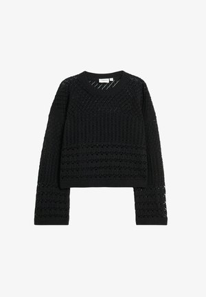 Musta lyhytneule, joka on valmistettu kudotusta kankaasta ja jossa on monimutkaisia pitsikuvioita ja ribbausreunat. Sweaterissä on pitkät hihat ja pyöreä pääntie.