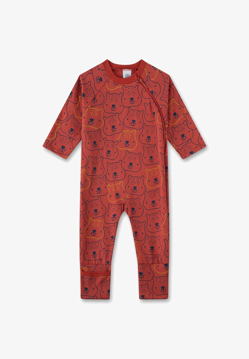 Red one-piece jumpsuit made of cotton, featuring a repeating pattern of bear faces in dark blue and yellow accents. Round collar and long sleeves.