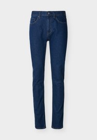 Σκούρο μπλε τζιν με στενή γραμμή, σχεδίαση με πέντε τσέπες, ορατή ραφή και κλείσιμο με κουμπί στη μέση. Λεία υφή.