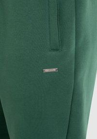 Smilodox CASUAL SPORT FIERO - Trainingsbroek - grün
