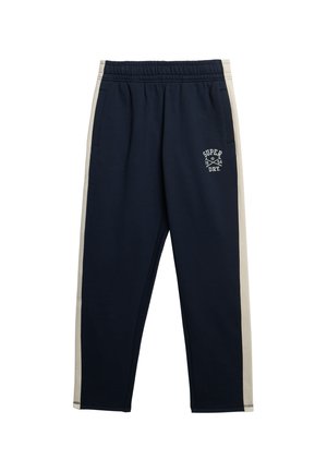 Pantaloni della felpa blu navy con strisce laterali beige, vita elastica e tasche frontali. Presenta un logo "Superdry" stampato sulla coscia.