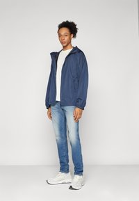 Diesel CLOG - Windbreakers - blue