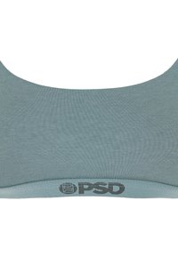 Haut de sport en tissu bleu-gris avec encolure large et logo de la marque PSD sur la bande élastique inférieure.