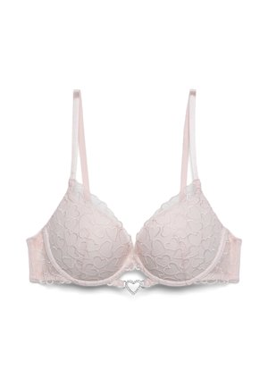 Reggiseno imbottito rosa chiaro con sovrapposizione in pizzo a motivi di cuori, spalline regolabili e un piccolo charm a forma di cuore con strass al centro davanti.