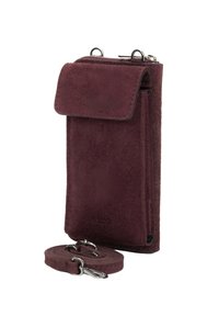 Bordowy zamszowy pokrowiec na telefon z klapką, z przednią kieszenią na zamek i srebrnymi okuciami. Zawiera regulowany pasek.