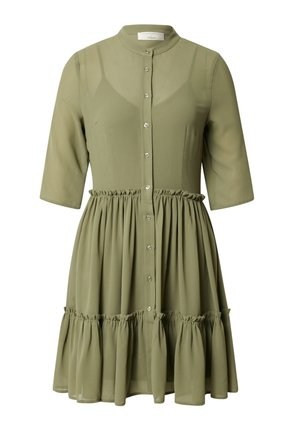 Licht olijfgroene jurk met knopen, een getailleerd lijfje, doorschijnende mouwen, een geraffineerde taille en een rok met meerdere volantlagen.