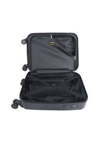 Black hard-shell suitcase with zipper closure, interior cross straps, and combination lock. Features smooth-rolling wheels and a textured lining.