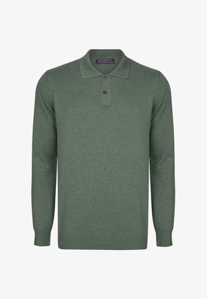 Roheline kootud kampsun, millel on kaelus, kolme nööbiga kinnitamine ja pikad varrukad. Ribitud mansetid ja ääred, tekstuuriga kangas.