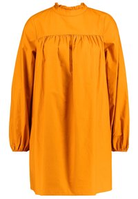 Oranssi puuvillamekko korkealla kauluksella, kerätyllä halkiolla ja pitkillä puffihihansuilla. Siinä on rento malli ja pehmeä rakenne.