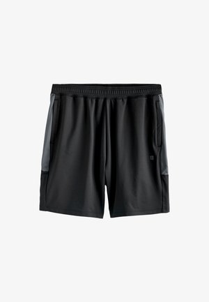 Pantalones deportivos negros hechos de tela suave y ligera. Presentan bolsillos laterales y paneles grises contrastantes a los lados. Cintura elástica.