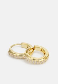 Gold hoop earrings featuring a row of small clear gemstones along the bottom edge, smooth finish, and a secure latch closure.