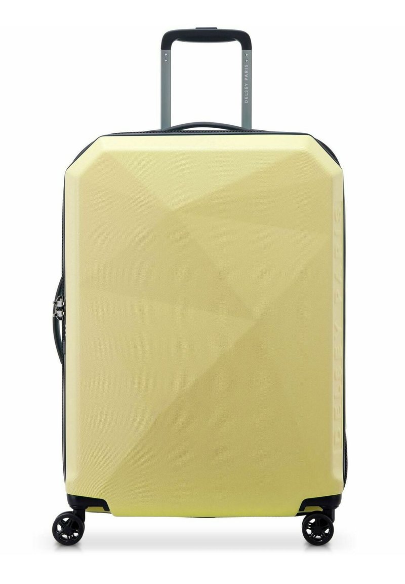 Valigia rigida di colore giallo chiaro con un design geometrico, dotata di manico retrattile, superficie testurizzata e quattro ruote.