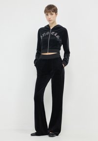 Calliope GINNICO CINIGLIA STRASS  - Pantaloni - nero