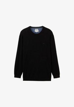 Fekete, hosszú ujjú pulóver bordás anyagból, kerek nyakkivágással. Diszkrét logóval rendelkezik a mellkason és kontrasztos belső gallérral.