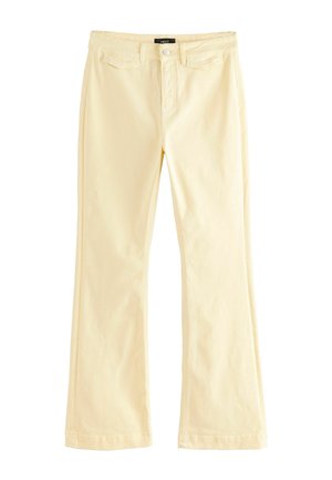 Geel flared jeans met een gladde textuur, vijf zakken en een standaard knoopsluiting. Gemaakt van denimstof met een lichte stretch.