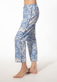Katoenen loungebroek met een blauw- en crèmewit bloemmotief, rechte snit en een contrasterende zwarte zijnaad, voorzien van een elastische tailleband.