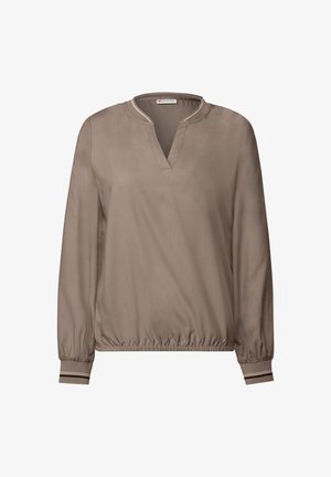 Bruine lange mouwen top met een V-hals, elastische zoom en manchetmouwen met gestreepte accenten. Soepele textuur en relaxte pasvorm.