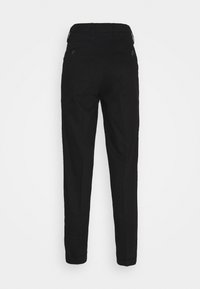 Black tailored pants made from a smooth fabric; features a standard waistband, belt loops, and two back pockets with button closures.