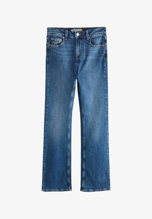 Sinine denimist valmistatud bootcut teksased, millel on viie tasku disain. Omab õmblusaktsente ja lukuga säärega, millel on metallist nööbiga sulgemine.