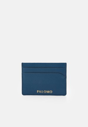 Blue leather cardholder with embossed "PALOMO" logo, features four card slots and a smooth texture, compact rectangular shape.