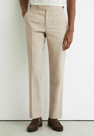 - Spodnie materiałowe