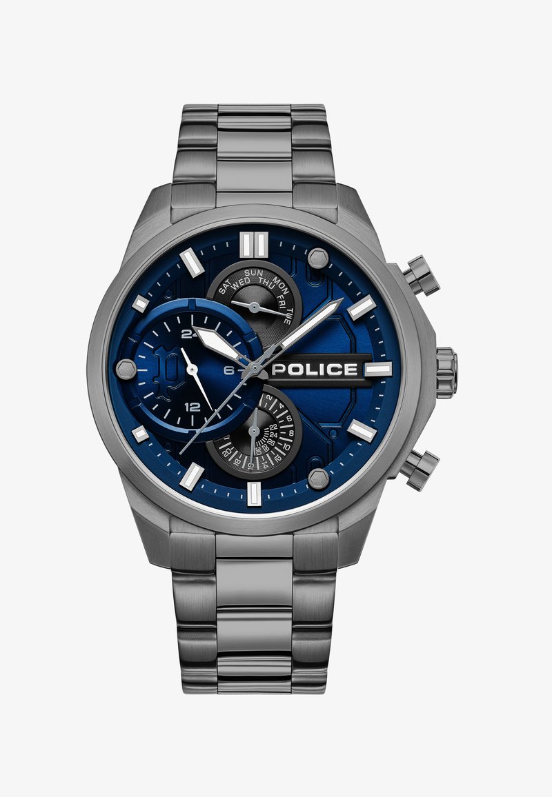 Grå metalur med en blå skive, sølvfarvede accenter og flere sub-dials. Har et armbånd i rustfrit stål og dristige numeriske markeringer.