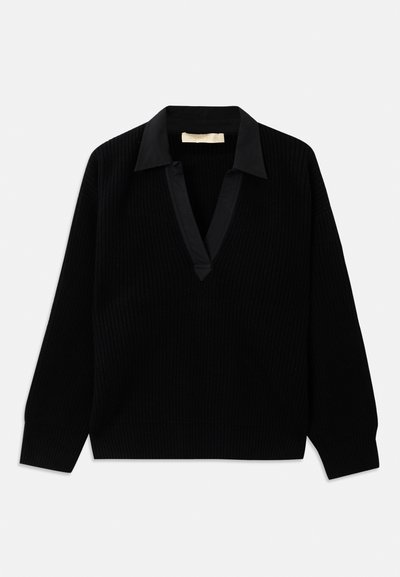 Black sweater featuring a ribbed texture, v-neck with a contrasting black collar and long sleeves. Simple design with no visible patterns.