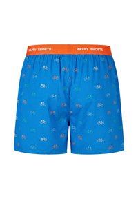 Short bleu avec de petits vélos imprimés en blanc, rouge et vert, et une ceinture orange marquée "HAPPY SHORTS."